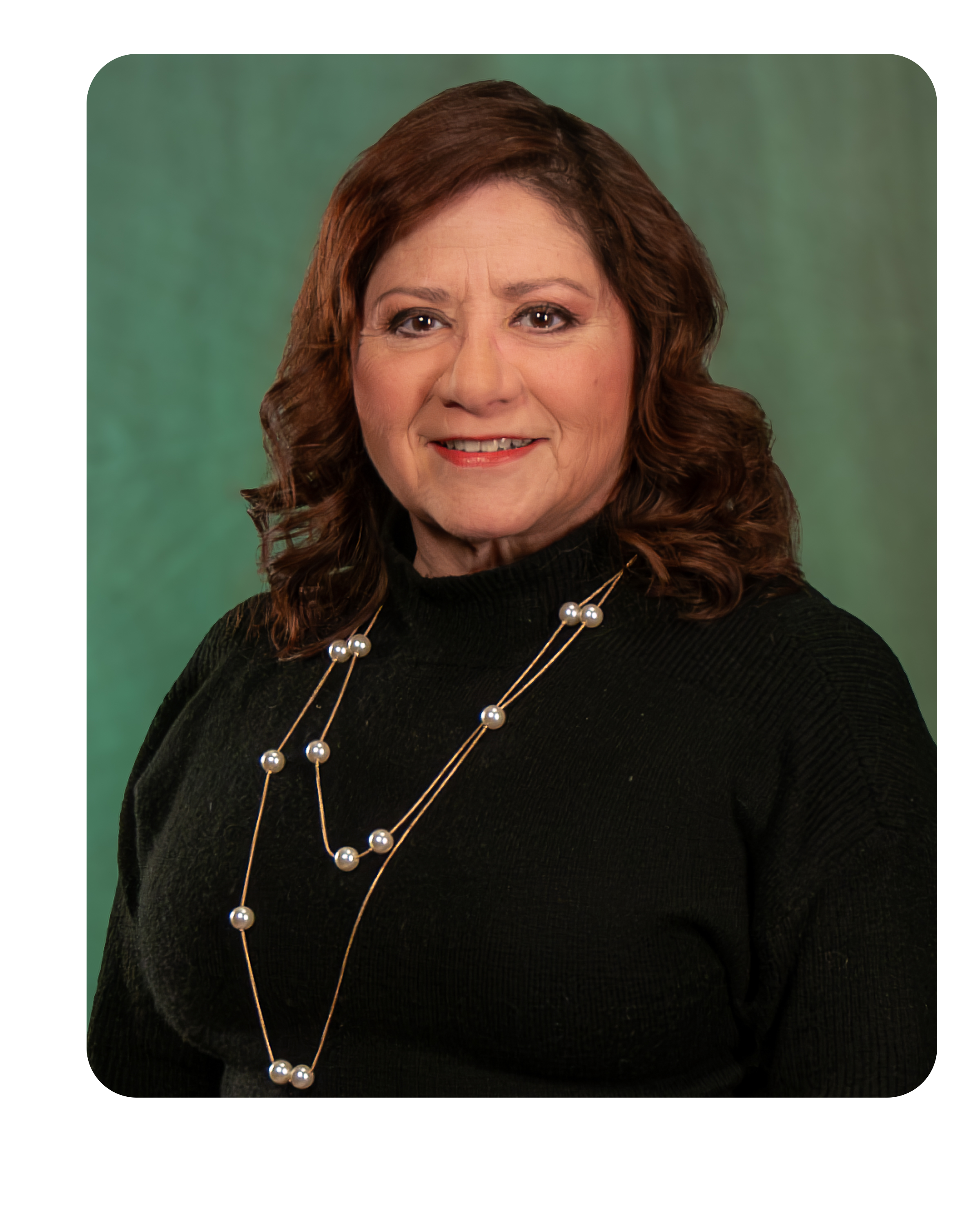 Headshot of Lourdes (Lou) Aguirre, Village Trustee
