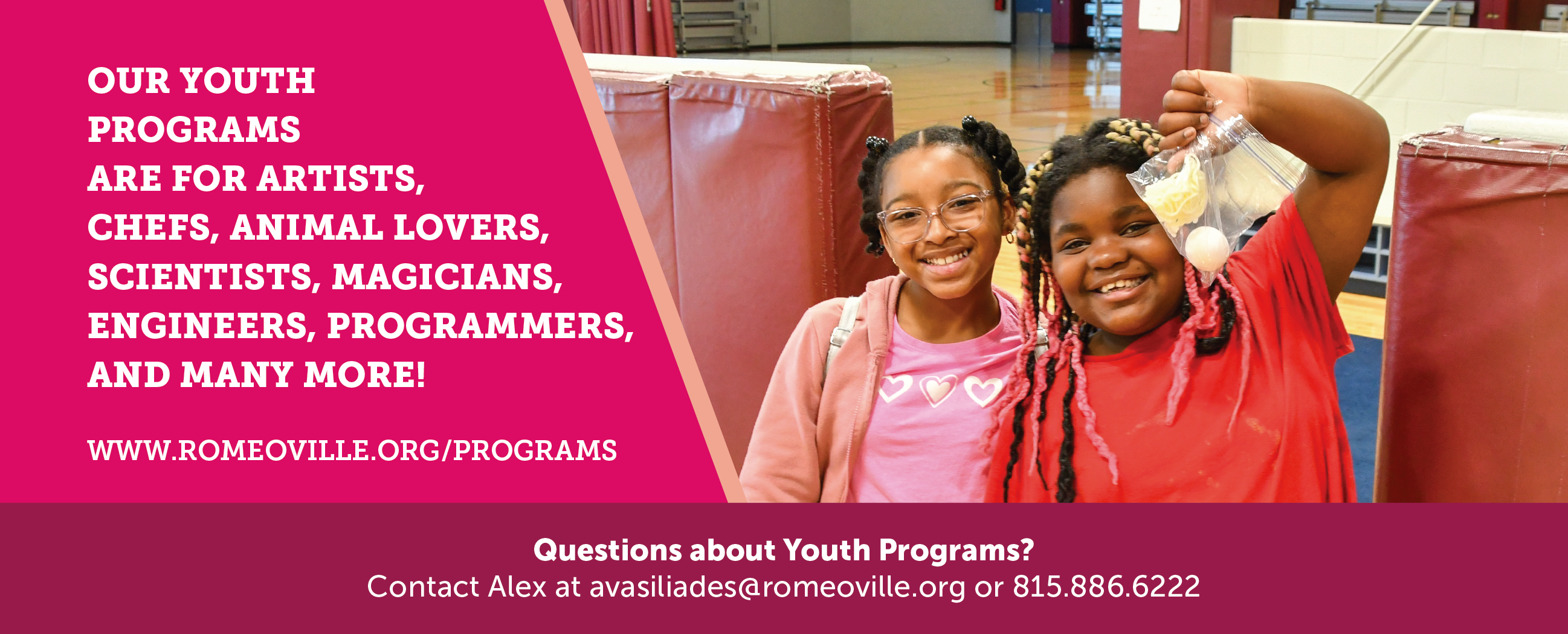 Youth Programs featuring two young girls displaying a class project